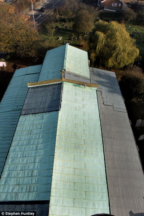 Damaged: The
          church has had to use roofing felt as a temporary measure, at
          a cost of thousands
