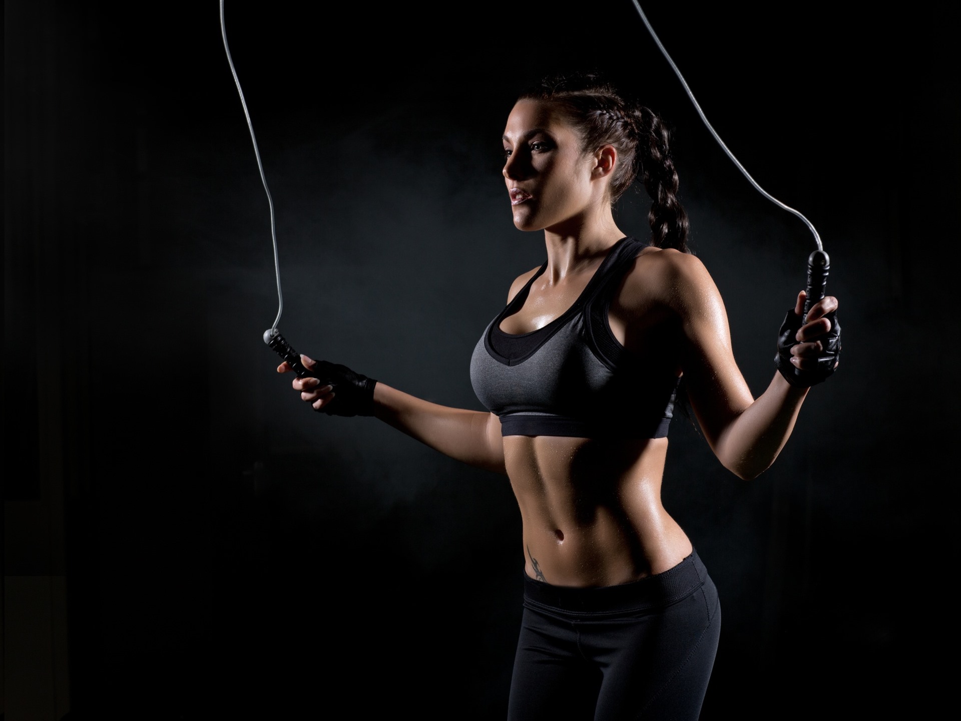 Fitness-girl-black-background-rope-skipping_1920x1440.jpg