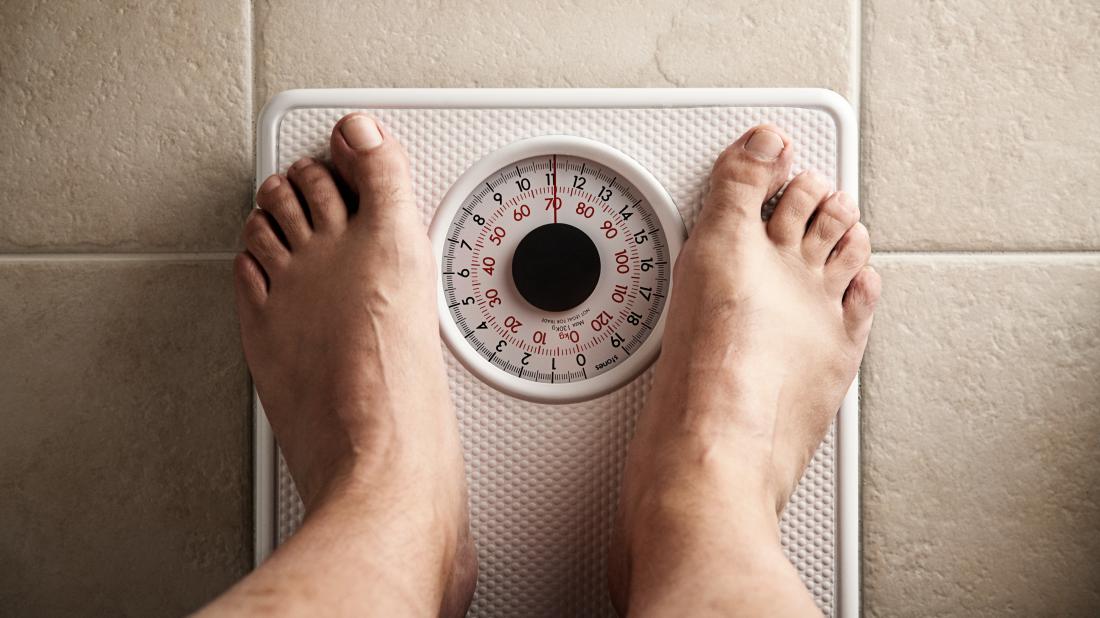a-mans-feet-on-some-scales-as-he-is-seeing-if-the-keto-diet-is-any-good-and-made-him-lose-weight.jpg
