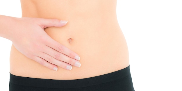 closeup-mid-section-fit-woman-with-stomach-pain_1134-4303.jpg