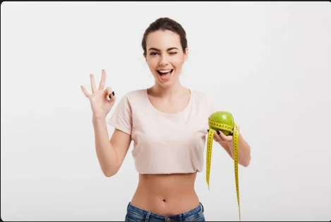 Woman holding apple.png