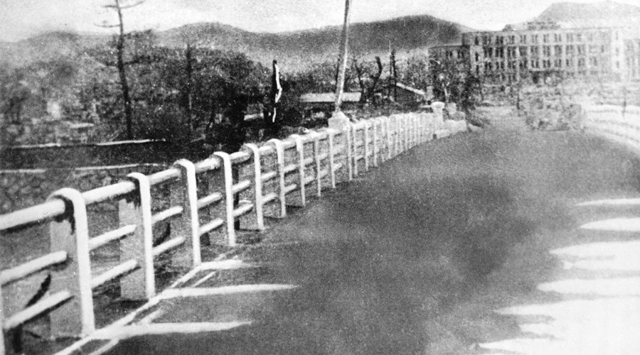 A bridge in Hiroshima following the atomic bombing.
                A photo taken in August 1945. © RIA Novosti